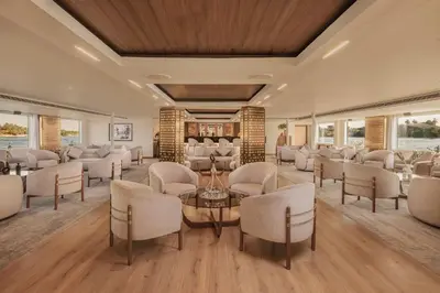 a waiting room with chairs and a table at Sonesta Star Goddess Cruise - Luxor- Aswan - 04 & 07 nights Each Saturday in Luxor