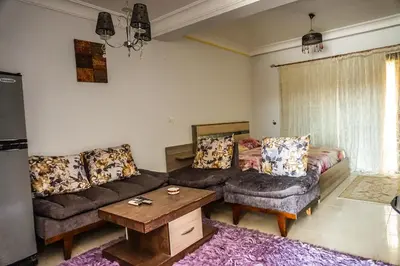 a living room with a couch and a table at Studio at Hurghada- NS2 in Hurghada