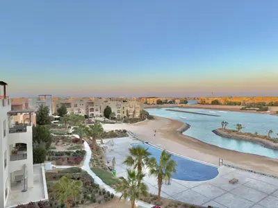 an aerial view of a resort with a beach at Golden Apartments El Gouna in Hurghada