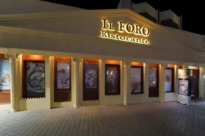 a building with a lot of pictures on the front at Regina Resort and Aqua Park Hurghada in Hurghada