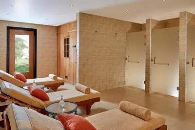 a large living room with couches and tables at JAZ Neo Reef Marsa in Coraya Bay