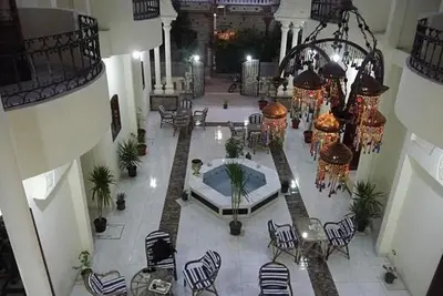 an overhead view of a lobby with a table and chairs at Al Hambra Hotel in Luxor