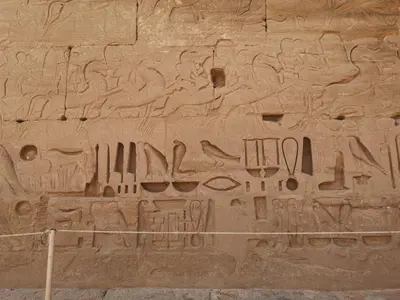 a wall with hieroglyphics on it at Apartment in Luxor city center-Nil in Luxor