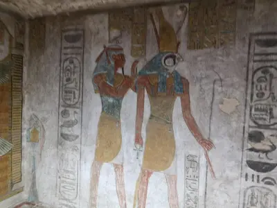 a painting of two people on a wall at Apartment in Luxor city center-Nil in Luxor