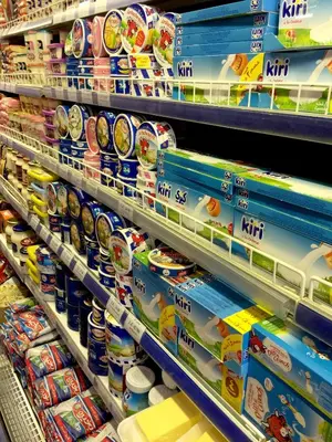 a supermarket aisle filled with lots of different types of food at Zebra House Hurghada center in Hurghada