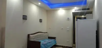 a room with a room with a blue ceiling at Chalet in Cecelia Resort in Hurghada