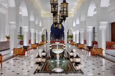 a lobby with a large hall with a large chandelier at Steigenberger Resort Alaya Marsa Alam - Red Sea - Adults Friendly 16 Years Plus in Coraya Bay