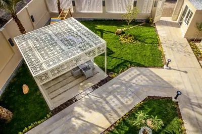 an overhead view of a garden with a white structure at Serenity Home Hurghada in Hurghada