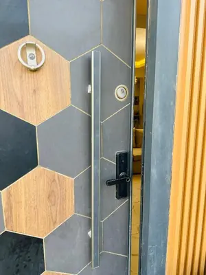 a metal door with a door knob on it at Alis Villa in Hurghada