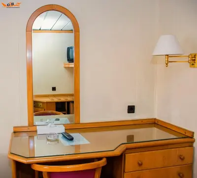 a dressing table with a mirror on top of it at GTS Nile Cruise Luxor Aswan every monday from Luxor friday from Aswan in Luxor