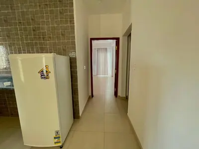 an empty hallway with a refrigerator in a room at Nile Panorama Hotel & Restaurant in Luxor
