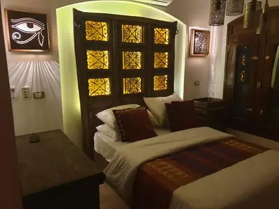a bedroom with a bed and a window at Dar Om Ali ElGouna Sabina y160 2 14 in El Gouna