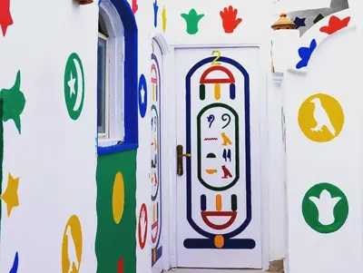 a door painted to look like a submarine at Onaty Ka Guest House in Aswan