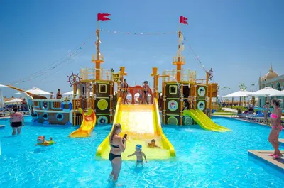 a group of people in the water at a water park at Titanic Royal-Families and Couples only in Hurghada