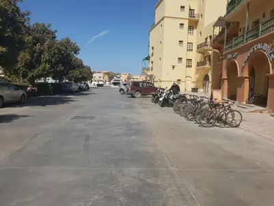 a row of bikes parked on the side of a street at EL Gouna Abu tig Studio- Economy stay in Hurghada