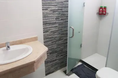 a bathroom with a sink and a shower at Sky Star Villa 25 in Hurghada