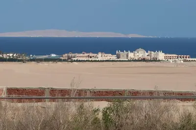 a view of a beach with buildings and the ocean at Sky Star Villa 25 in Hurghada