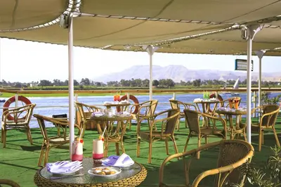 a group of tables and chairs under a tent at Jaz Crown Prince Nile Cruise - Every Monday from Luxor for 07 & 04 Nights - Every Friday From Aswan for 03 Nights in Luxor