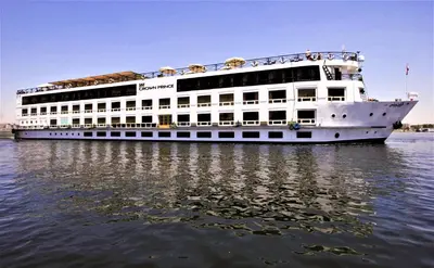 a large cruise ship sitting in the water at Jaz Crown Prince Nile Cruise - Every Monday from Luxor for 07 & 04 Nights - Every Friday From Aswan for 03 Nights in Luxor