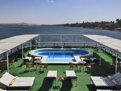 a cruise ship with a swimming pool on the water at JAZ Imperial Nile Imperial Cruise - Every Thursday from Luxor- Aswan- Luxor for 07 Nights in Luxor