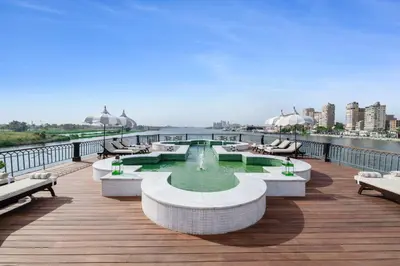 a deck with a fountain on top of a building at Movenpick SS Misr Steamer Nile Cruise - 04 & 07 Nights Each Monday From Luxor and 03 Nights Each Friday from Aswan in Luxor