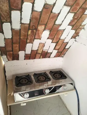 an old stove in a room with a roof at Roma House in Aswan