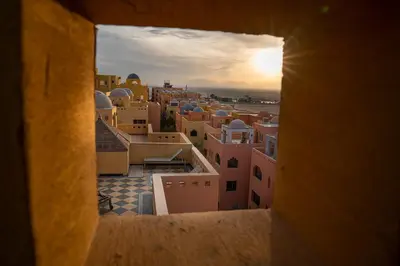 a view of a city from the roofs of buildings at Al Dora Resort Hurghada in Hurghada