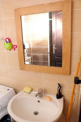 a bathroom with a sink and a mirror above it at Apartment F in Florenza Khamsin in Hurghada