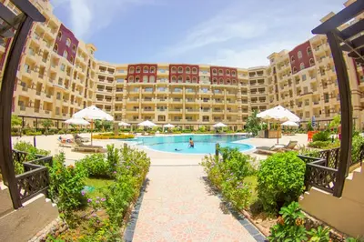 a view of a resort with a swimming pool at Studio H in Florenza Khamsin in Hurghada