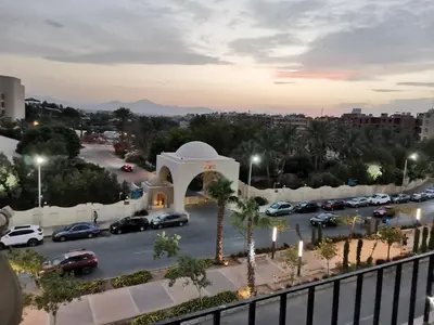 a view of a parking lot with cars parked at Studio Lotus compound near Touristic Mamsha in Hurghada