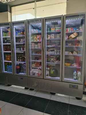 a refrigerator with its doors open and food inside at Studio beside El Gouna with good kite spot in 500 m in Hurghada