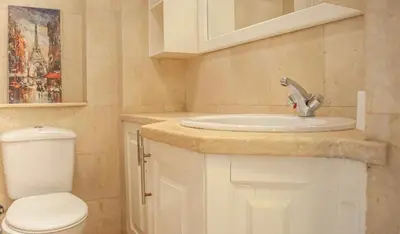 a bathroom with a sink and a toilet at El Gouna 1 bedroom apartment in West Golf Y12 in Hurghada