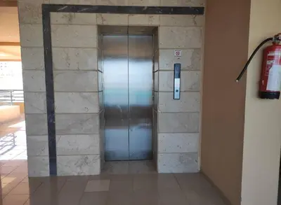 a elevator in a building with a metal door at Full Apartment with Panoramic View of Hurghada in Hurghada