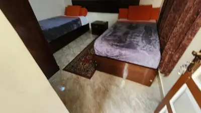 an overhead view of a bedroom with two beds at Dara guest House in Aswan