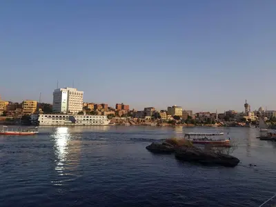 a view of a river with a city in the background at Dara guest House in Aswan