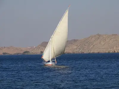 a sail boat in a large body of water at Wanas Kato Guest House in Shellal