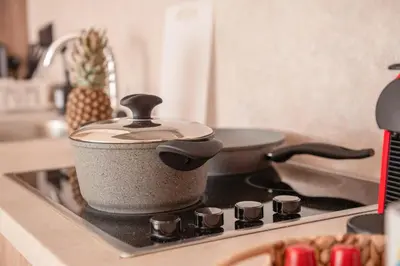 a pot sitting on top of a stove at Earthy & Tranquil 1 BDR Mangroovy Free Pool & Beach Access in Hurghada