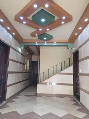 an empty hallway with a ceiling with a vault at Abeer Suites in Hurghada