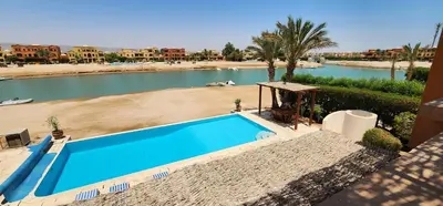 an overhead view of a swimming pool next to a beach at Nayah Stays, Lagoons beach, Paradise 3 ensuite with private pool in El Gouna