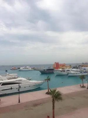 a group of boats docked in a harbor at Amazing 2 bedrooms' Flat Marina El-Hurghadah in Hurghada