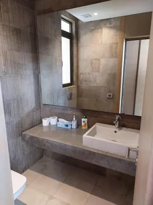 a bathroom with a sink and a mirror at El Gouna luxe in Hurghada