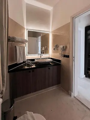 a bathroom with a sink and a mirror at GS 18 Villa in Hurghada