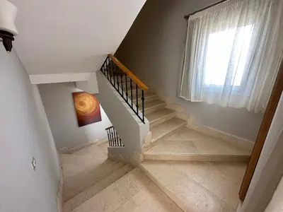 a staircase in a house with a window at GS 18 Villa in Hurghada
