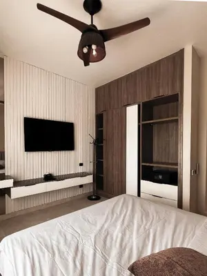 a bedroom with a bed and a ceiling fan at GS 18 Villa in Hurghada