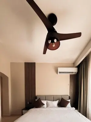 a ceiling fan sitting on top of a bed at GS 18 Villa in Hurghada