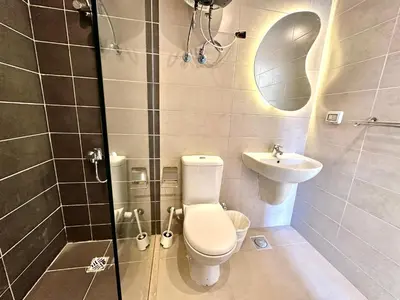 a bathroom with a toilet and a sink at G cribs 2 BR sharing Pool in Hurghada