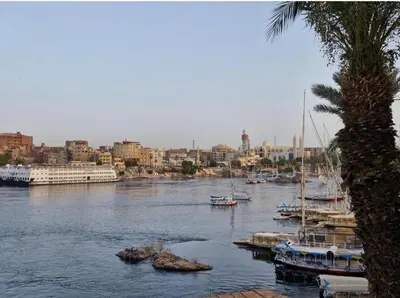 a view of a harbor with boats in the water at Jamaica Guest House in Aswan