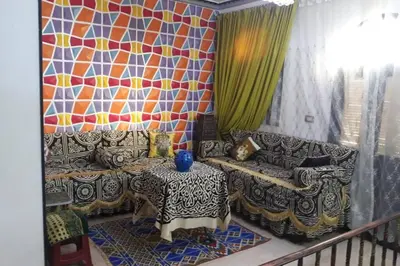 a living room with a couch and a table at Private House with Garden and terrace in Aswan in Aswan