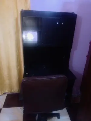 a suitcase sitting in the corner of a room at App11- BELAL - Enjoy the privacy of staying in a quiet apartment with free Wi-Fi as your complete second home in the heart of Hurghada in Hurghada