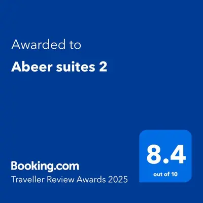 a blue text box with the words awarded to sleep suites at Abeer suites 2 in Hurghada